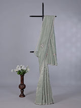 Pista green soft tissue silk saree for reception wear