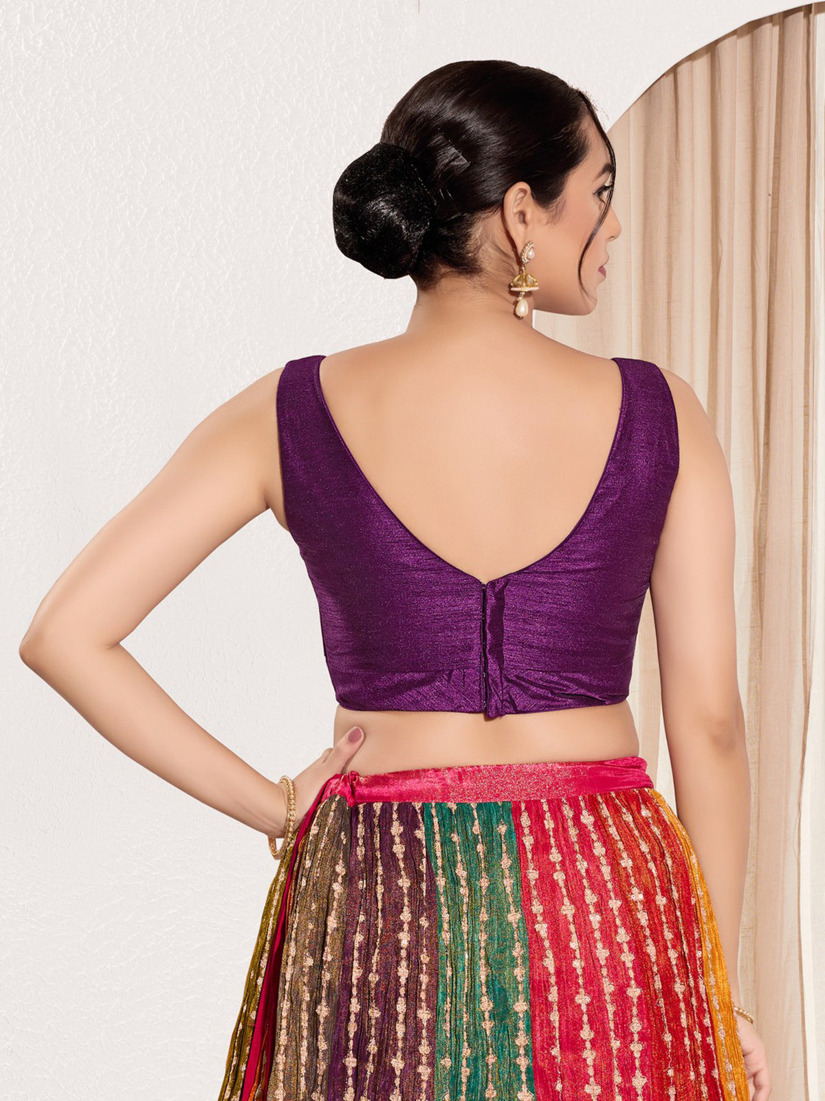 Purple silk round neck sleeveless festive blouse