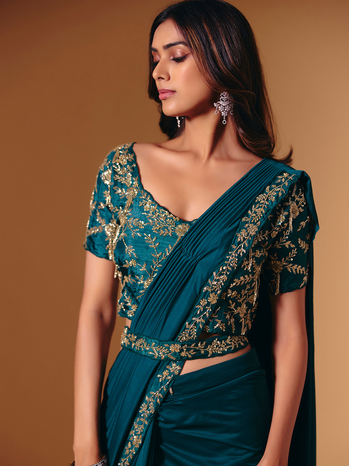 Rama green satin lycra saree with sparkling cutdana work