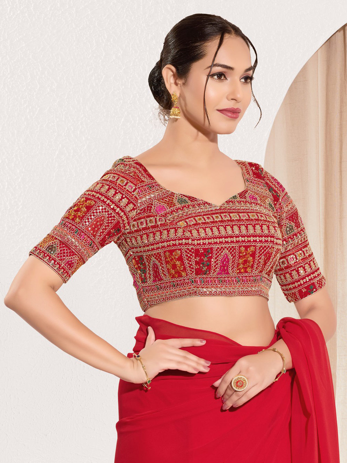 Red brocade blouse with embroidery and sequins work