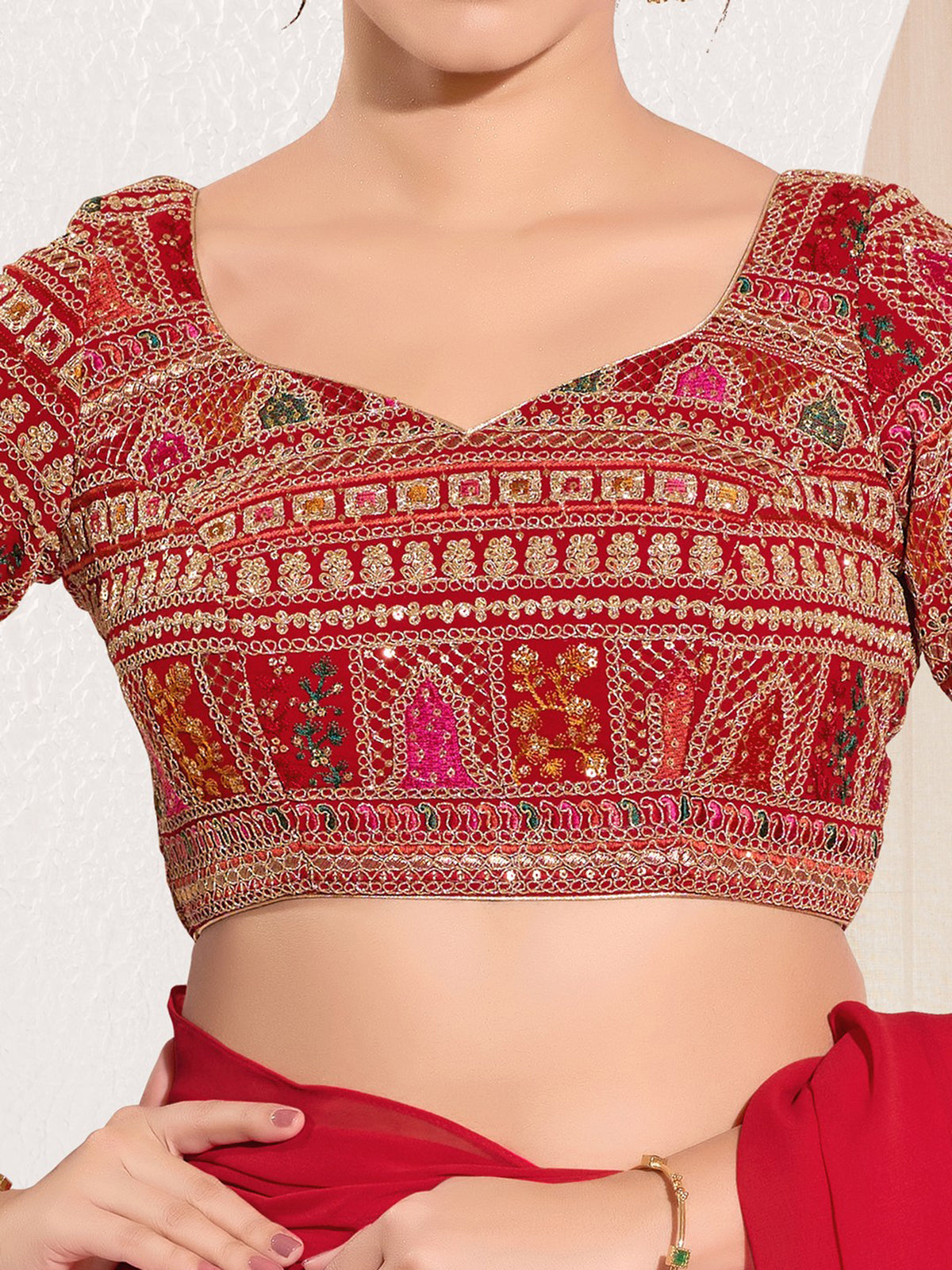 Red brocade blouse with embroidery and sequins work