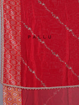Red dola silk saree with sparkling festive embellishments