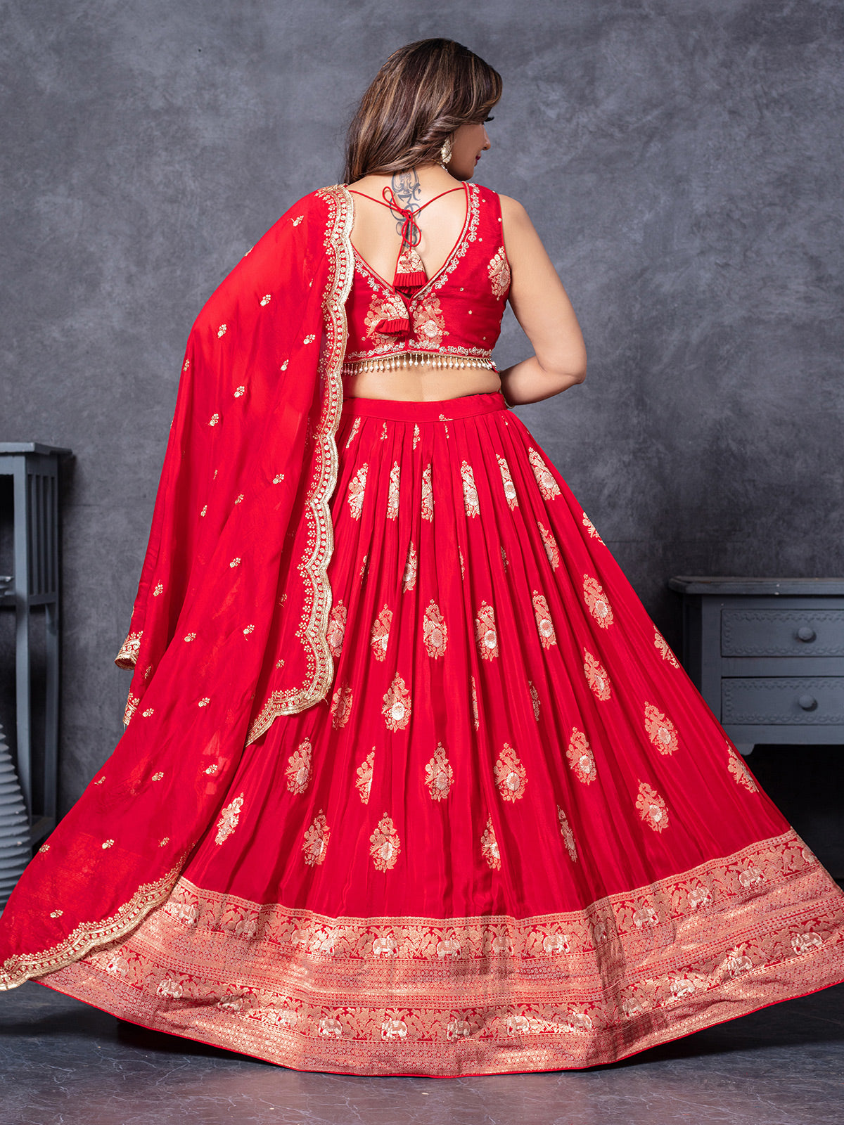 Red silk lehengac choli with zardosi embellishment