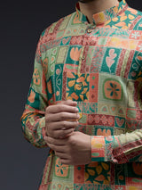 Rich silk green kurta suit in unique ethnic print
