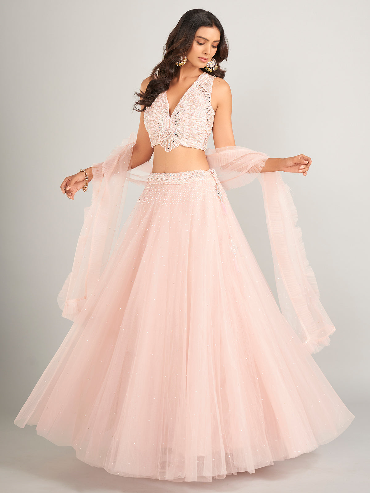 Stunning light pink net lahenga choli
