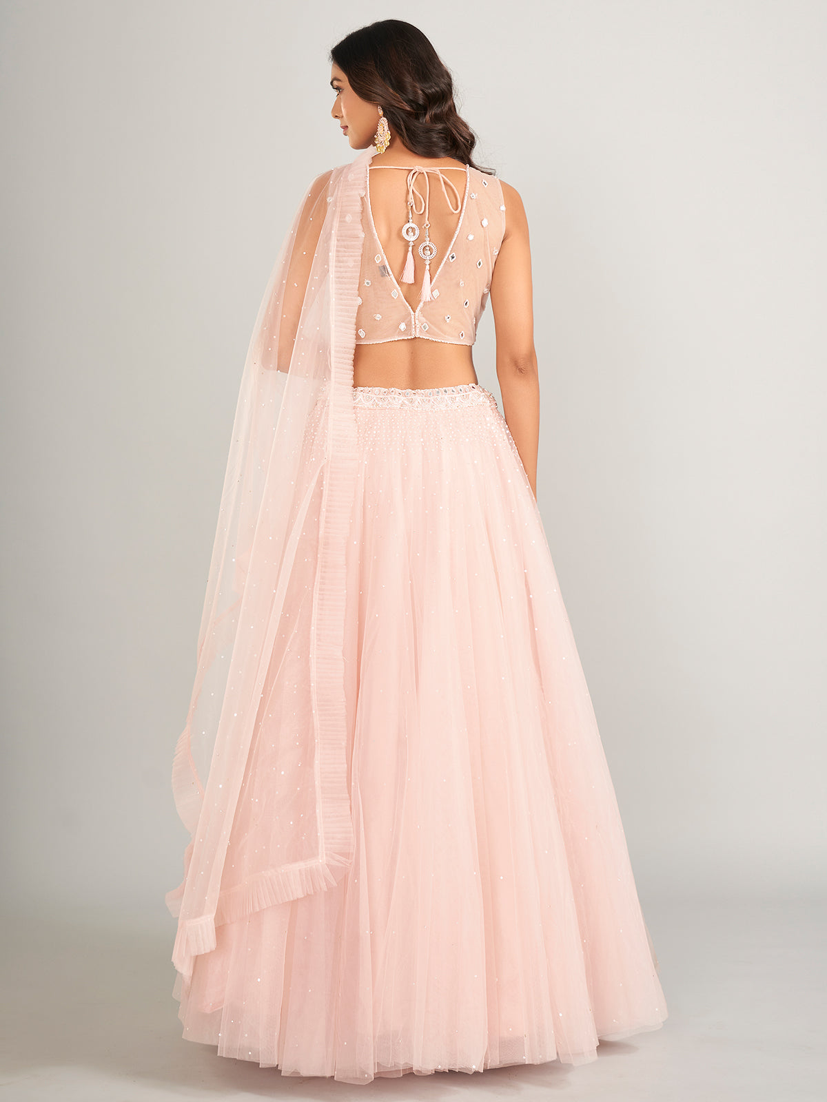 Stunning light pink net lahenga choli