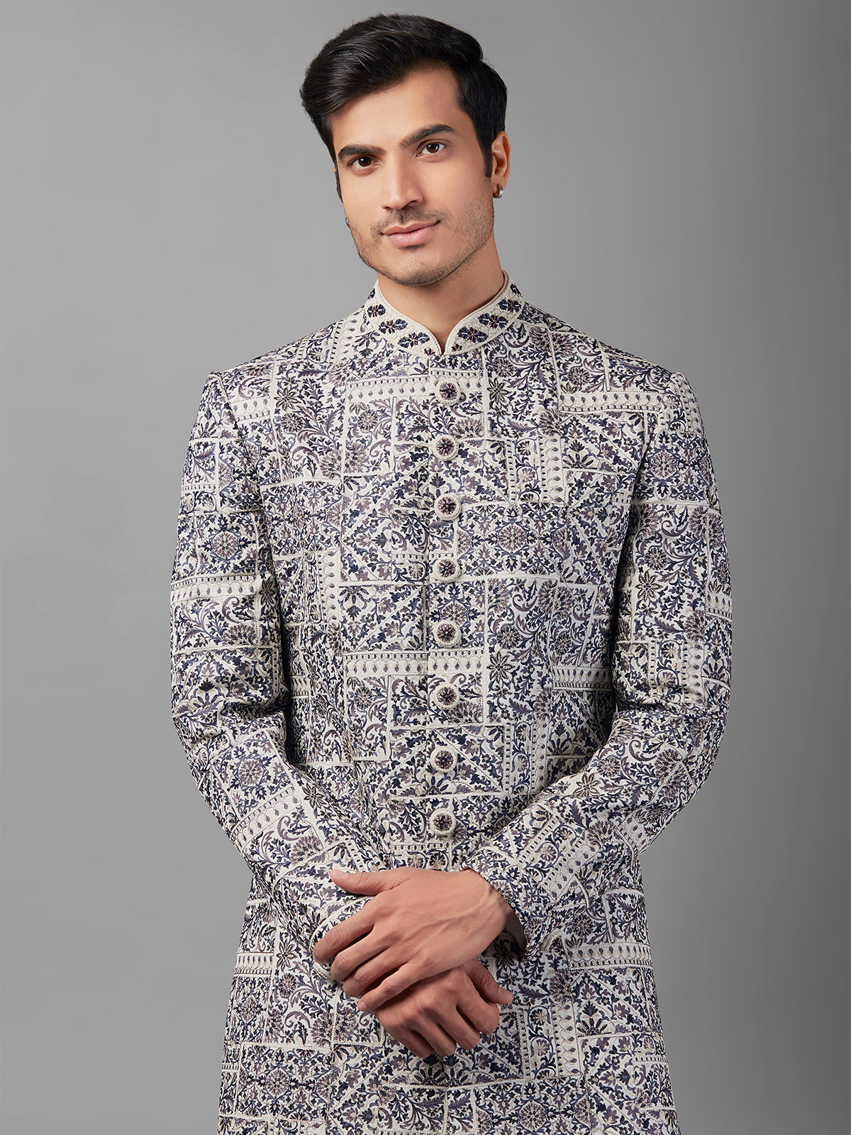 Stunning white embroidery sherwani