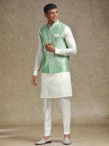White and light green waistcoat set with intricate embroidery