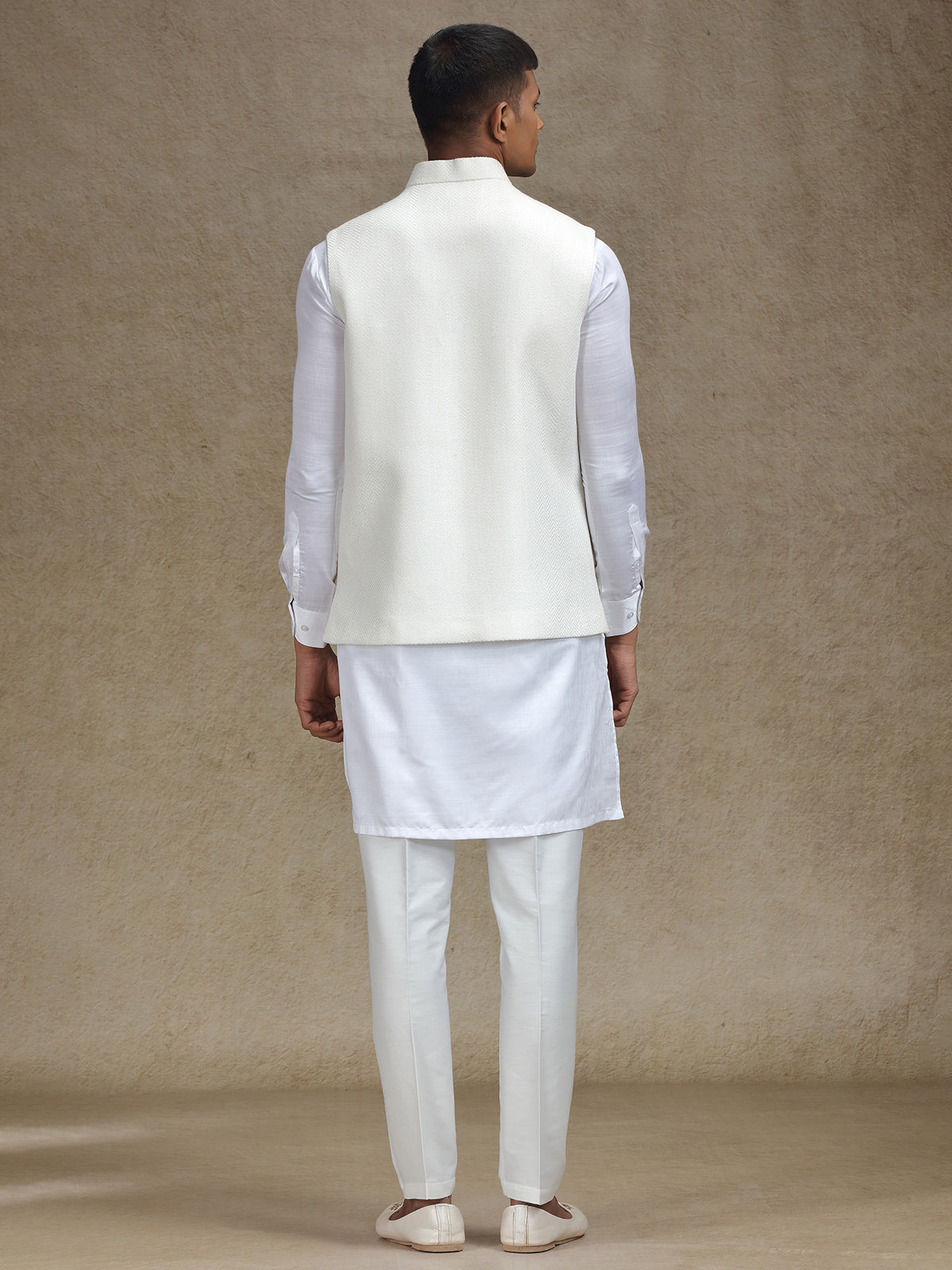 White waistcoat set with intricate work for mens wear