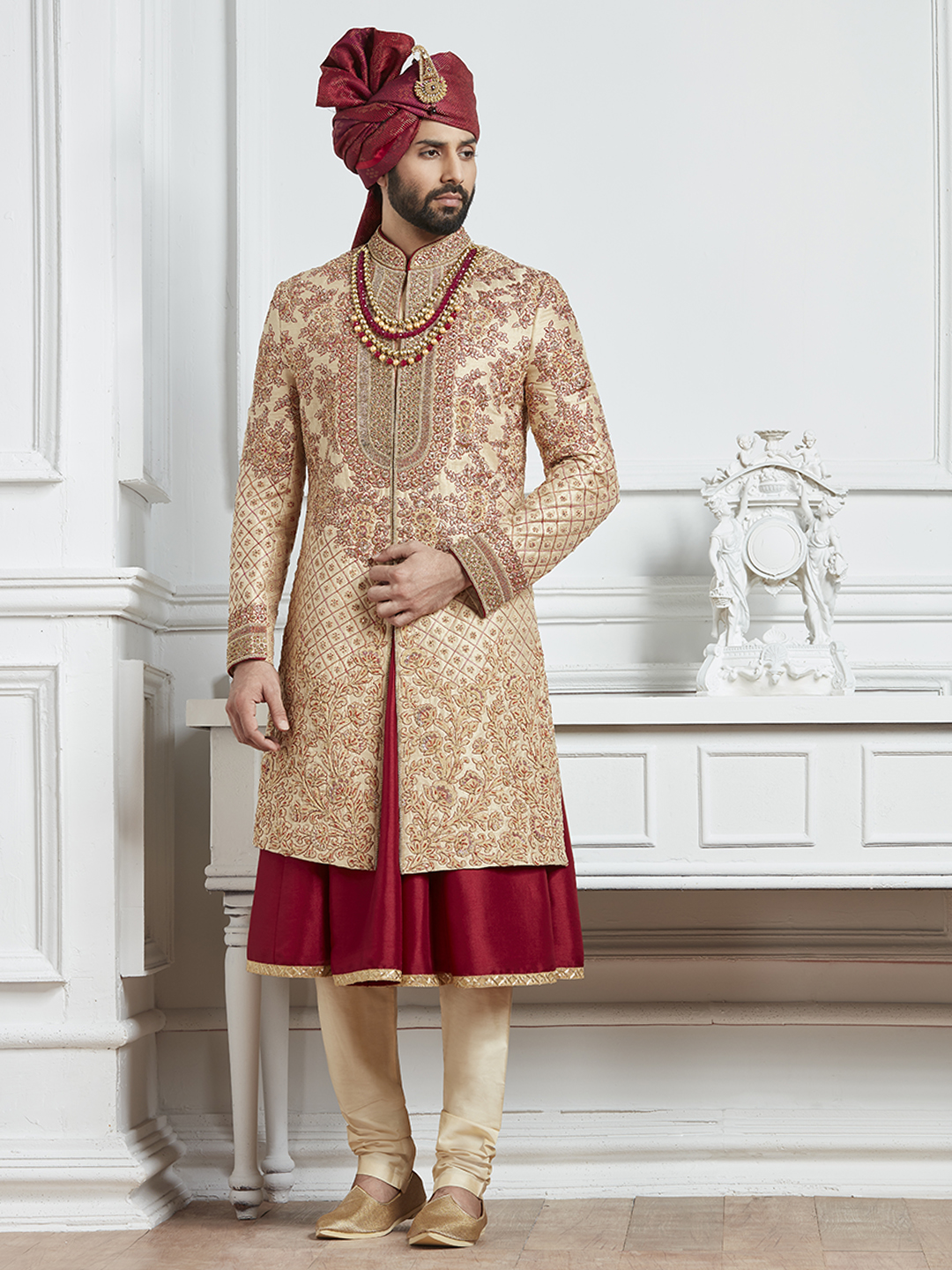 Beige and red raw silk groom indo 