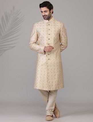 A royal beige sillk sherwani wedding wear