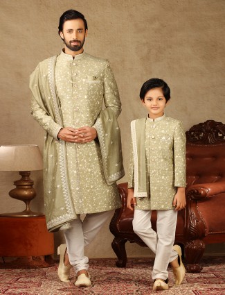 Amazing green raw silk father and son concept sherwani