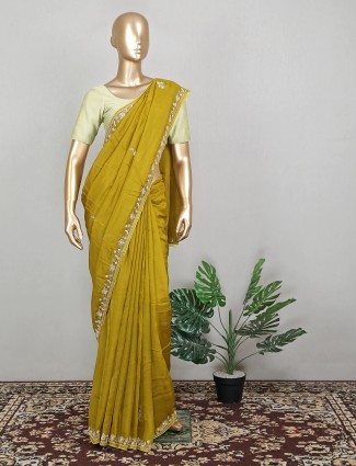 Attirable mustard yellow wedding look tissue silk saree