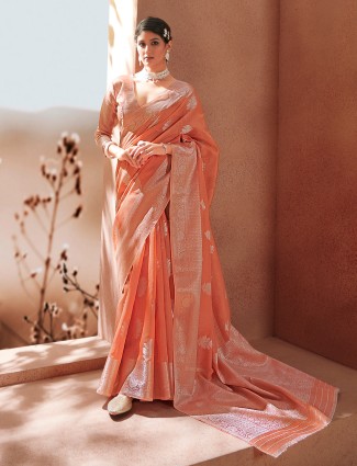 Attirable peach festive ceremonies linen saree