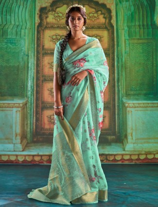 Attractive mint green linen wedding event saree