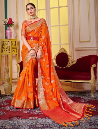Beautiful fire orange muga silk saree for wedding occasions