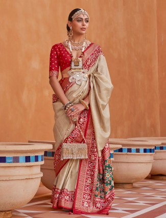 Beige wedding wear patola silk saree