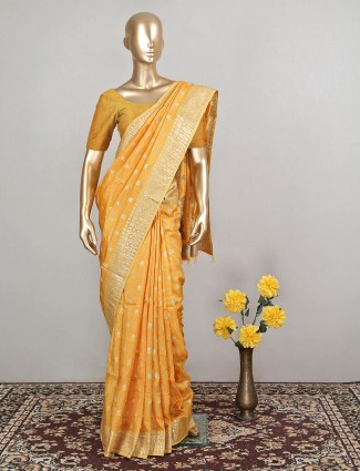 Canary yellow pleasant wedding events dola silk saree