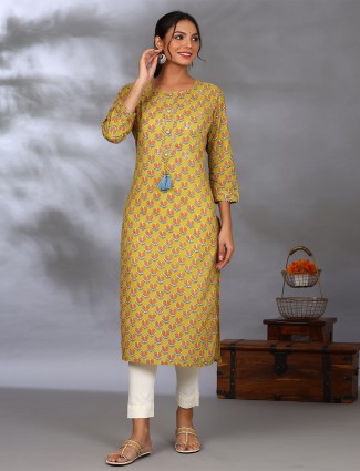 Casual wear printed kurti in charming mustard yellow hue