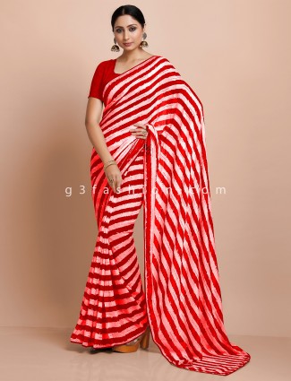 celebrity style red and white georgette saree in stripe