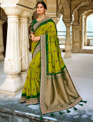 Charming pine green wedding season dola silk saree