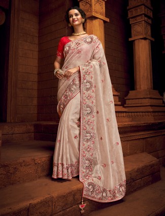 Classy peach tissue silk saree for wedding events