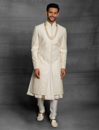 Cream hue raw silk wedding wear sherwani for mens