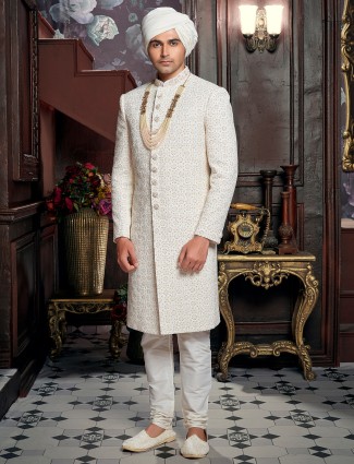 Cream hued cotton silk wedding wear sherwani
