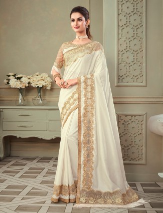 Cream special raw silk saree for festive and party