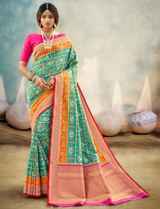Designer aqua saree for wedding events in patola silk