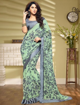Fabulous pistachio green printed georgette sari