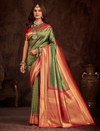 Green banarasi silk saree with contrast border