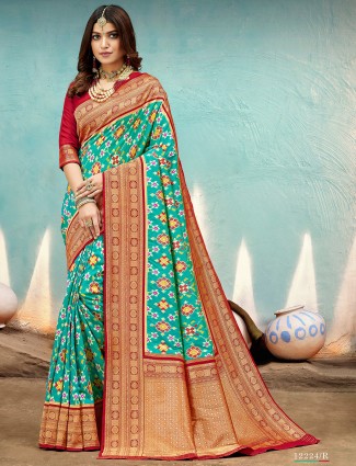 Latest designer aqua saree for wedding events in patola silk