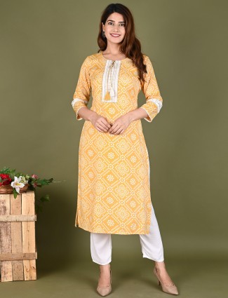 Latest ochre yellow printed cotton casual wear kurti