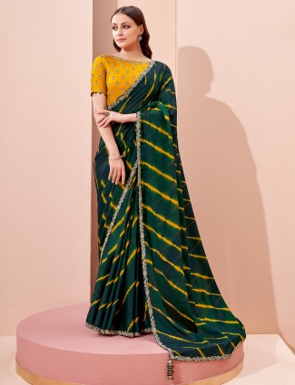Latest peacock green saree for festive events in georgette
