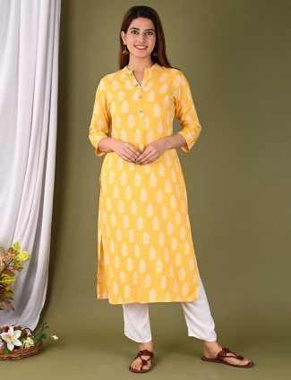 Latest printed casual wear yellow kurti in cotton