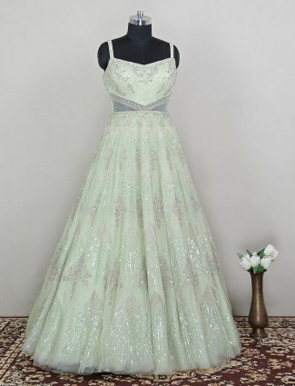 Lavish pistachio green designer net wedding wear gown