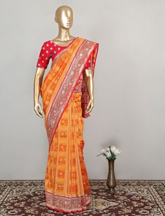 Light orange designer wedding wear bandhej silk saree
