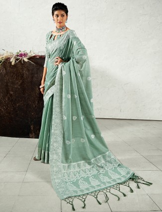 Linen saree for festive functions in charming rock green
