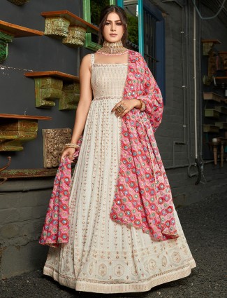 Off white floor length gown in georgette fabric