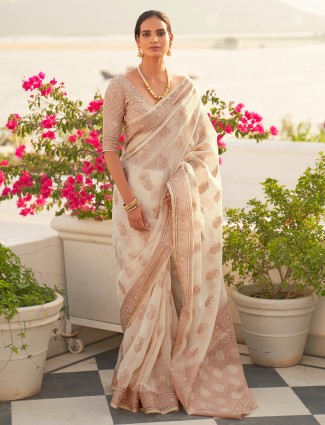 Off-white linen saree for festive functions