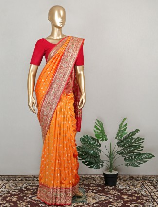 Orange charming silk saree for wedding ceremonies