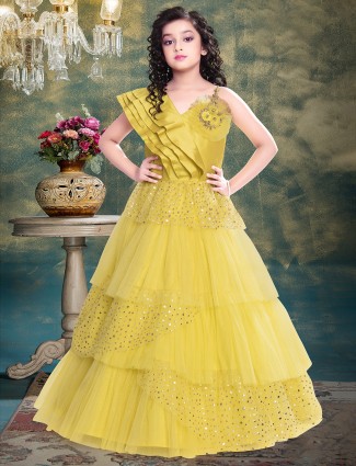 Pale yellow designer party wear net gown for girls