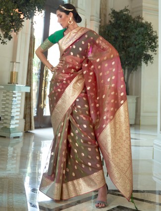 Party season tissue silk saree in pink color with zari work
