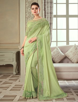 Pastel green splendid raw silk saree for festive and party