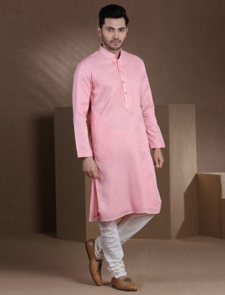 Pink solid cotton festive kurta with churidar