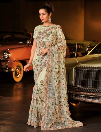 Pistachio green amazing lycra sari for wedding and party functions