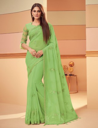 Pistachio green stunning satin saree for party events