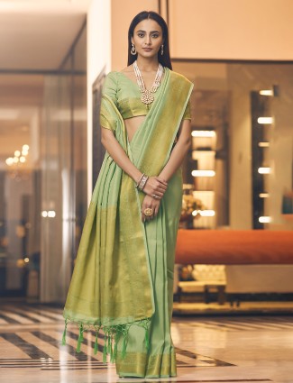 Pistachio green wedding occasions raw silk saree for women