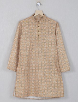 Printed cotton kurta suit in mustard yellow color
